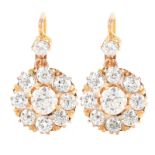 Circa 1940s Approx. 3.50 Carat Old Mine Cut Diamond and 18 Karat Yellow Gold Pendant Earrings. Diam