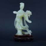 Chinese Serpentine Jade Carved Kwan Yin Figure on Wooden Stand. Has some old restorations. Measures