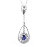 Approx. 1.0 Carat Oval Cabochon Sapphire, 1.25 Carat Round Brilliant Cut Diamond