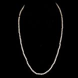 Antique Single Strand One Hundred Twenty Five (125) Graduated White Pearl Neckla