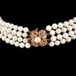 Vintage Four Strand 8mm White Pearl and 14 Karat Yellow Gold Necklace. Stamped 1