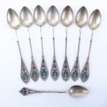 Collection Of Eight (8) Gilt Silver Plique-à-jour Spoons. seven matching measure