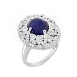 Approx. 6.27 Carat Oval Cabochon Sapphire, 1.50 Carat Round Brilliant Cut Diamon