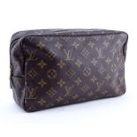 Louis Vuitton Brown Monogram Coated Canvas Toiletry Pouch GM. Golden brass hardware, tan leather in