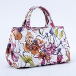 Prada Multi-Colored Floral Motif Canvas Canapa Mini Tote. Gold tone hardware, interior of pink canv