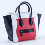 Celina Red/White And Black Tricolor Luggage Tote MM. Antique silver tone hardware, black leather in