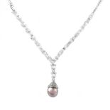 Approx. 3.0 Carat Baguette and Round Brilliant Cut Diamond, South Sea Pearl and 18 Karat White Gold