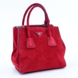 Prada Red Suede Leather Glace Handbag. Silver tone hardware, red leather interior with zippered and