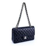 Chanel Black Quilted Leather Classic Double Flap Bag 26. Gold tone hardware. The interior of burgun