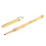 Vintage 14 Karat Yellow Gold Pendant Mechanical Pencil. Unsigned. Good condition. Measures (closed)