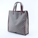 Gucci Beige Supreme Coated Monogram Canvas And Leather Tall Tote. Gold tone hardware. Natural canva