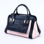 Chloe Light Pink and Black Mini Alice PM Smooth Calf Leather Handbag. Gold tone hardware, fabric in