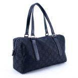 Gucci Black Monogram Nylon And Leather Signature Satchel Tote. Silver tone hardware, interior of st