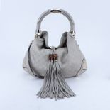 Gucci Beige Monogram Leather Indy Hobo Guccissima MM Bag. Gold tone hardware. The interior with pat