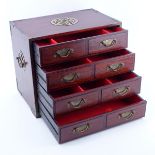 Mid Century Chinese Jewelry Box with Brass Fittings. Four large sliding doors with red lined interi