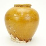 Chinese Tang Dynasty Lemon Yellow Glazed Round Vase. Unsigned. Good condition. Measures 5-1/4" H. S