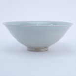Chinese Song Dynasty (1127–1279) Oingbai Ware Bowl. a bowl with freely combed wavy lines in the int