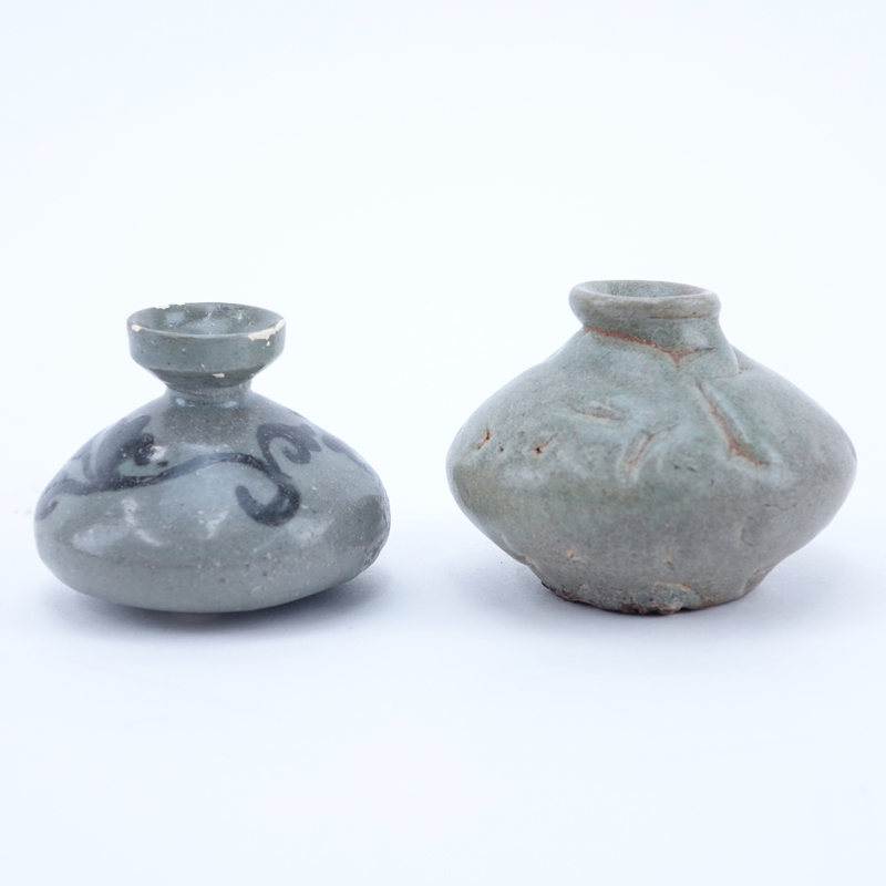 Two (2) Chinese Goryeo Dynasty, 12th - 14th Century Celadon Glazed Oil Bottles. One decorated in bl