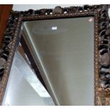 A reproduction gilt framed and bevelled wall mirror, h.