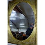 A reproduction gilt framed oval wall mirror,