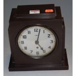 A 1930s bakelite mantel clock of stepped form