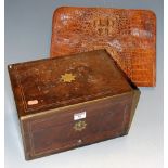 An early Victorian rosewood and brass bound hinge top jewellery box having blue lined interior over