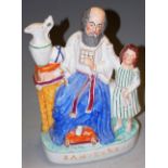 A Victorian Staffordshire pottery figure titled Samuel & Eli,