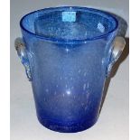 A Farinelli blue tinted glass twin handled vase of tapering form with bubble inclusions, height 22.