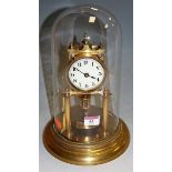 A Continental brass 400-day anniversary clock, having a glass dome, h.