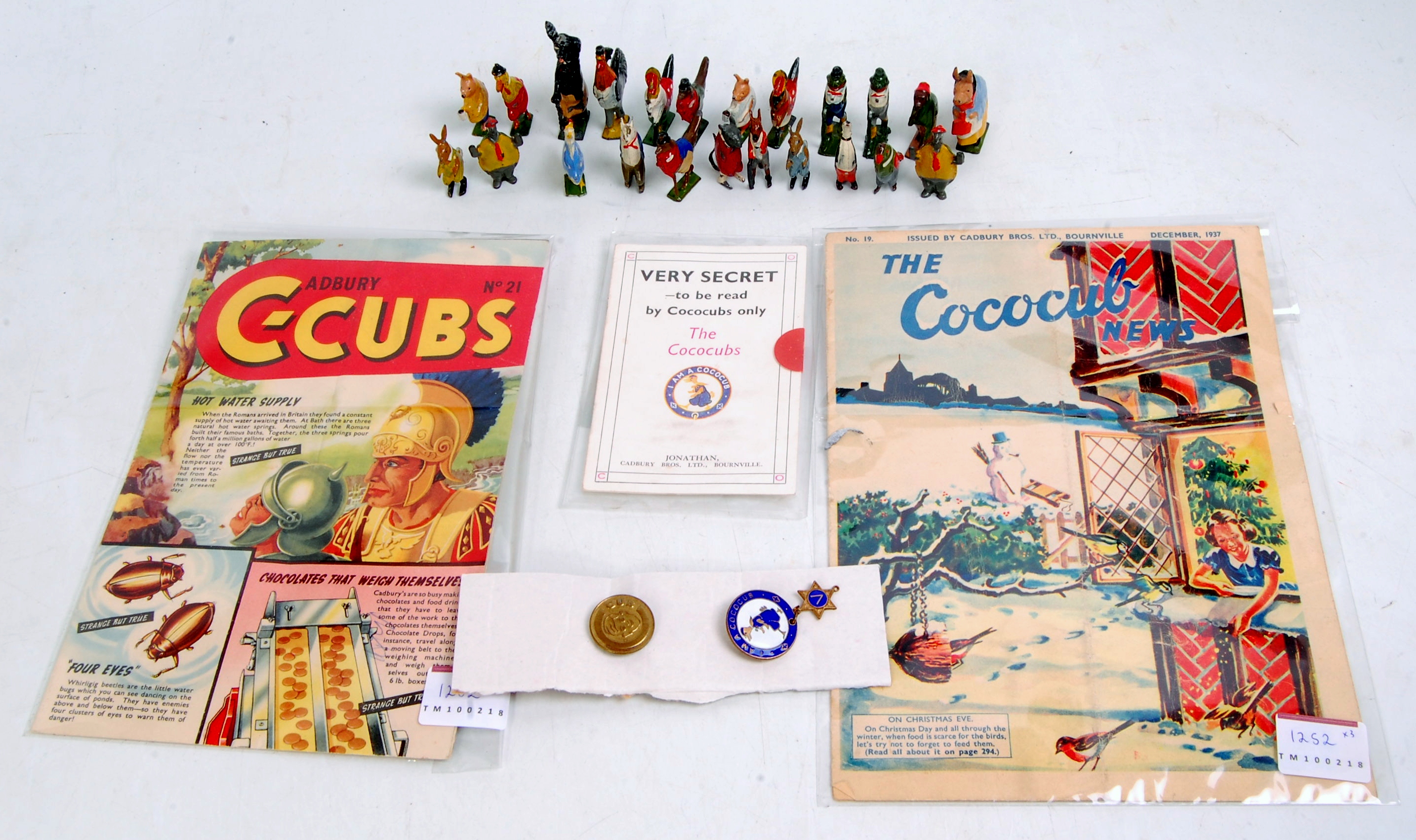 Britains Cococubs Group, to include 23 various Cococub Figures, 2 Cococubs Pin Bagdes,