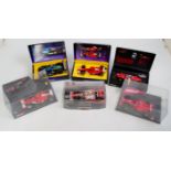 6 various boxed or cased slot racing cars to include Scalextric Sport, Carrera Evolution, and Ninco,