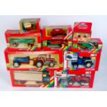 10 various boxed Britains 1/32nd scale Tractors and Farm Implements, all in rainbow window boxes,