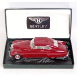 Minichamps 1/18th scale model of a 1954 Bentley R-Type Continental, finished in red,