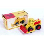 Dinky Toys, 976 Michigan 180-III tractor dozer, yellow and red body with red engine covers,
