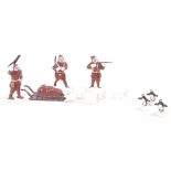 A modern white metal Snow Expedition Group, 8 examples to make up the diorama, to include Sledge,
