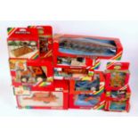 12 various boxed Britains 1/32nd scale Tractors and Farm Implements, all in rainbow window boxes,