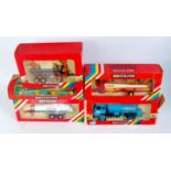 Five boxed Britains modern release farming implements, all in original rainbow window boxes,