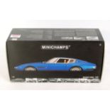 Minichamps 1/18th scale model of a Maserati Ghibli 1969, finished in metallic blue,