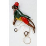 A Lehmann of Germany tinplate and clockwork model of Tom the Climbing Monkey,