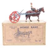 Britains Farm Series, Set 8F - Horse Rake, comprising of light blue Rake with Red Spoked Wheels,