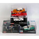 Carrera and SCX 1/32nd scale Cased Slot Car Group, 4 examples,