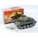 Marx plastic and Battery operated Cap Firing Tank, camouflage body, with packet of caps,