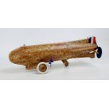 An Unusual repainted tinplate and battery operated model of a Air ship,