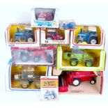 Ten various boxed or carded ERTL mixed scale farming diecast models,
