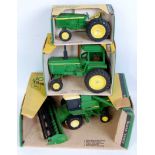 Three boxed ERTL large heavy pressed steel and diecast John Deere tractor and combine groups,