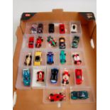 22 assorted loose Scalextric Micro and AFX miniature slot racing cars,