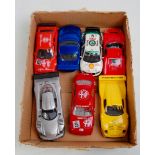 7 various loose Hornby Hobbies and Scalextric slot racing cars, mixed examples to include Ford GT40,