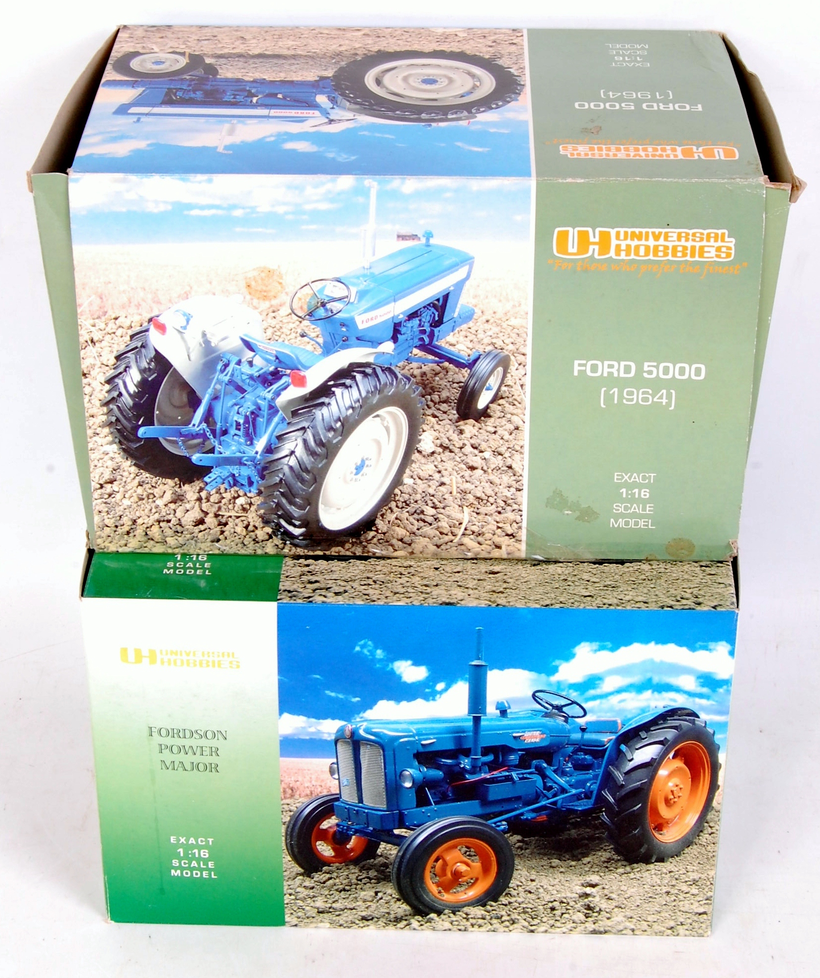 Universal Hobbies 1/16th scale boxed tractor group, both missing exhausts,