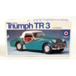 An Entex 1/24 scale plastic kit for a 1959 Triumph TR3 in the original all card box appears as