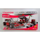 A Cobi Toys plastic building brick construction set for a Vodafone McLaren Mercedes MP425 car with